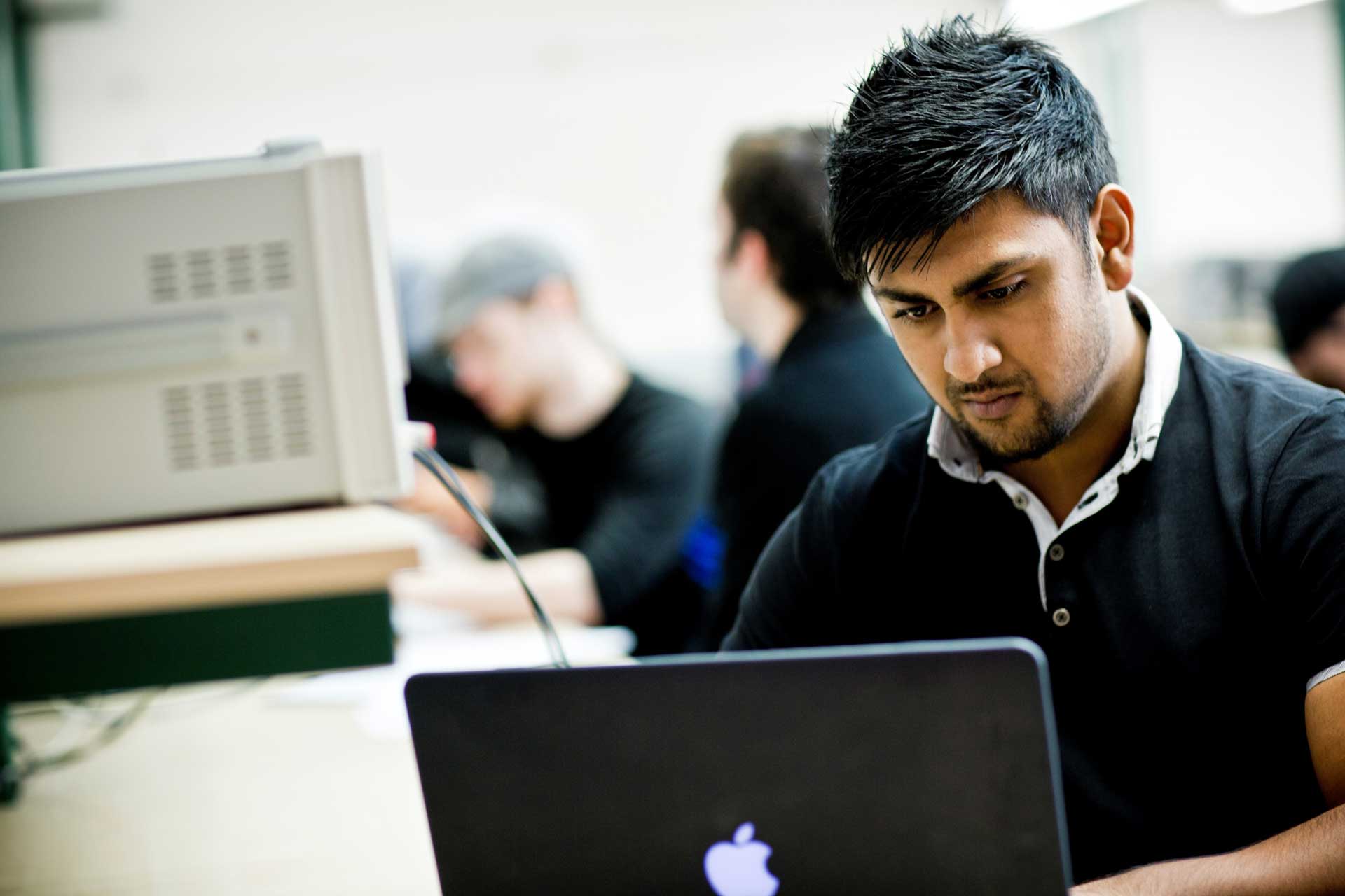 Student working on a laptop